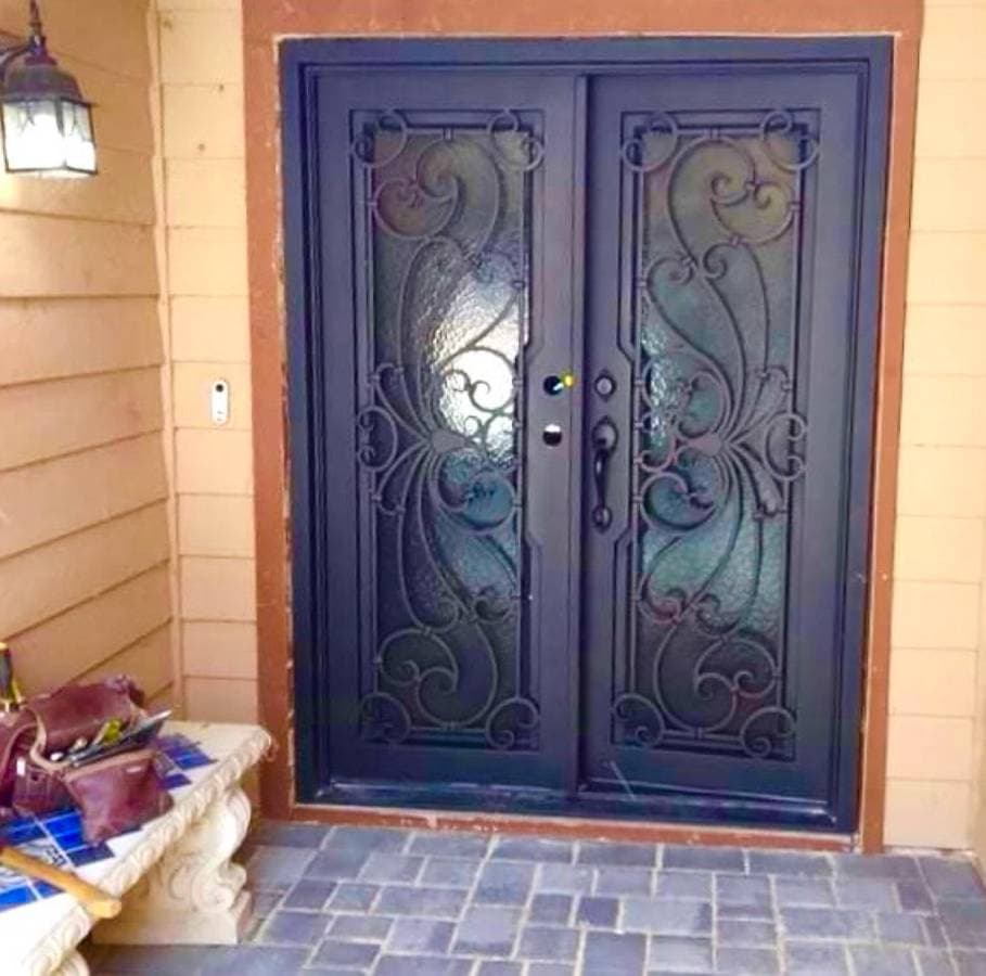Custom double iron security doors installed on residential home in Carmichael California